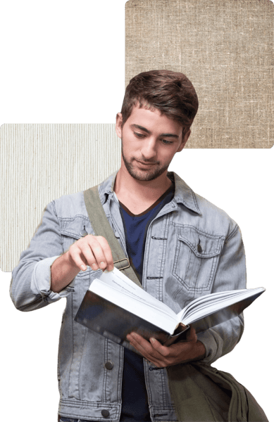 A person in a denim jacket holds an open book, with textured background patterns in neutral tones