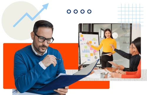 A person in a blue sweater reviews documents while another presents data charts on a board, discussing insights with colleagues.